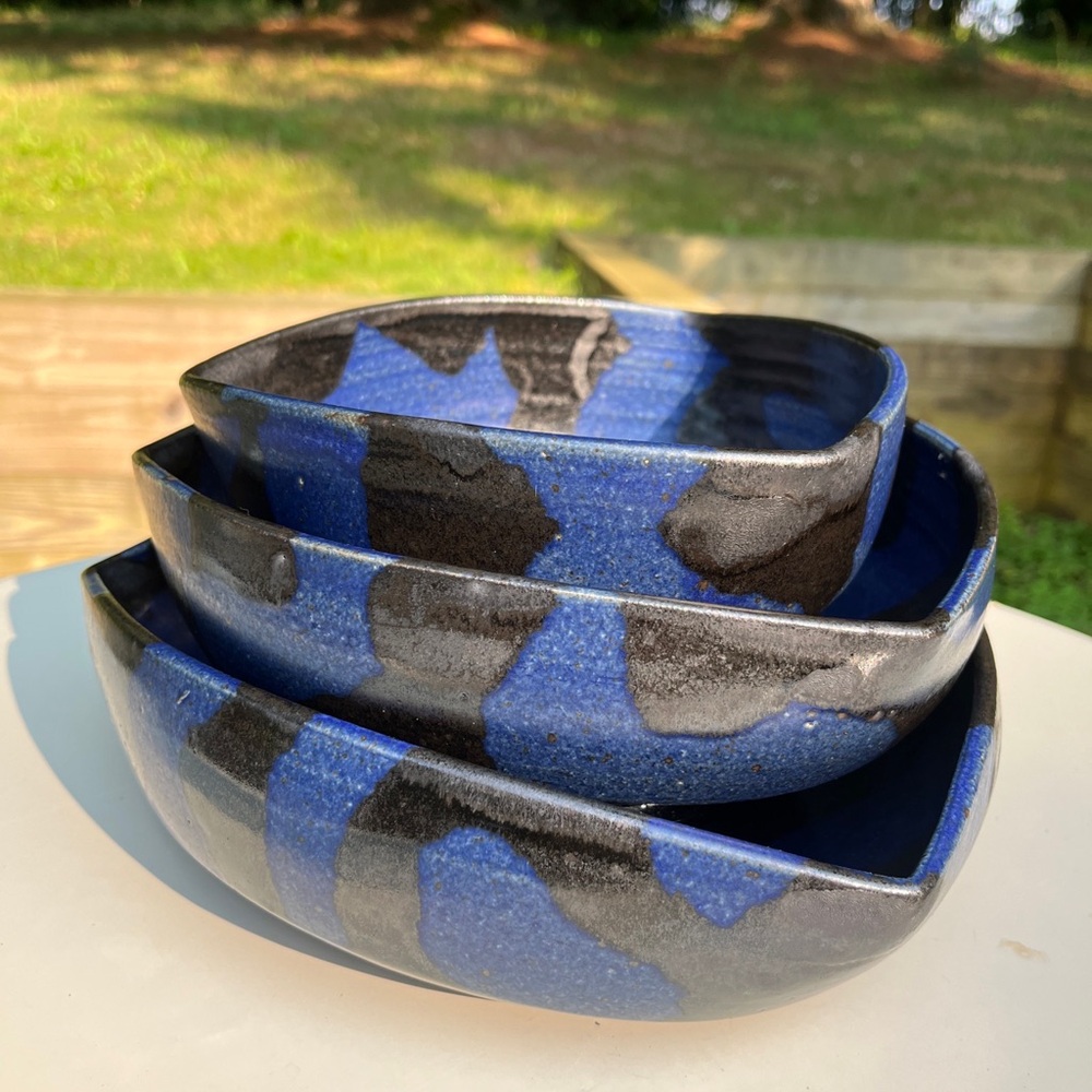 Set of Three (3) Nesting bowls hand thrown and signed with a makers mark pinched